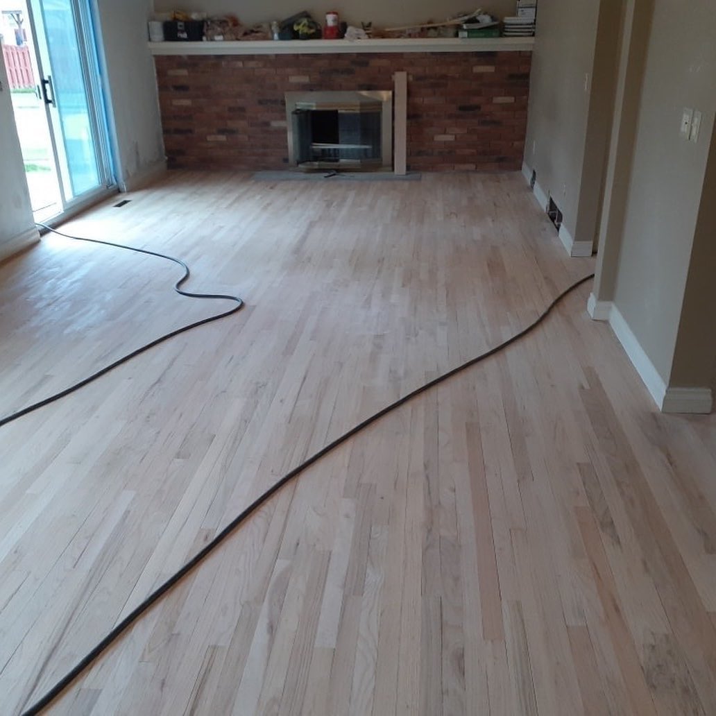 Oak hardwood flooring in large living room